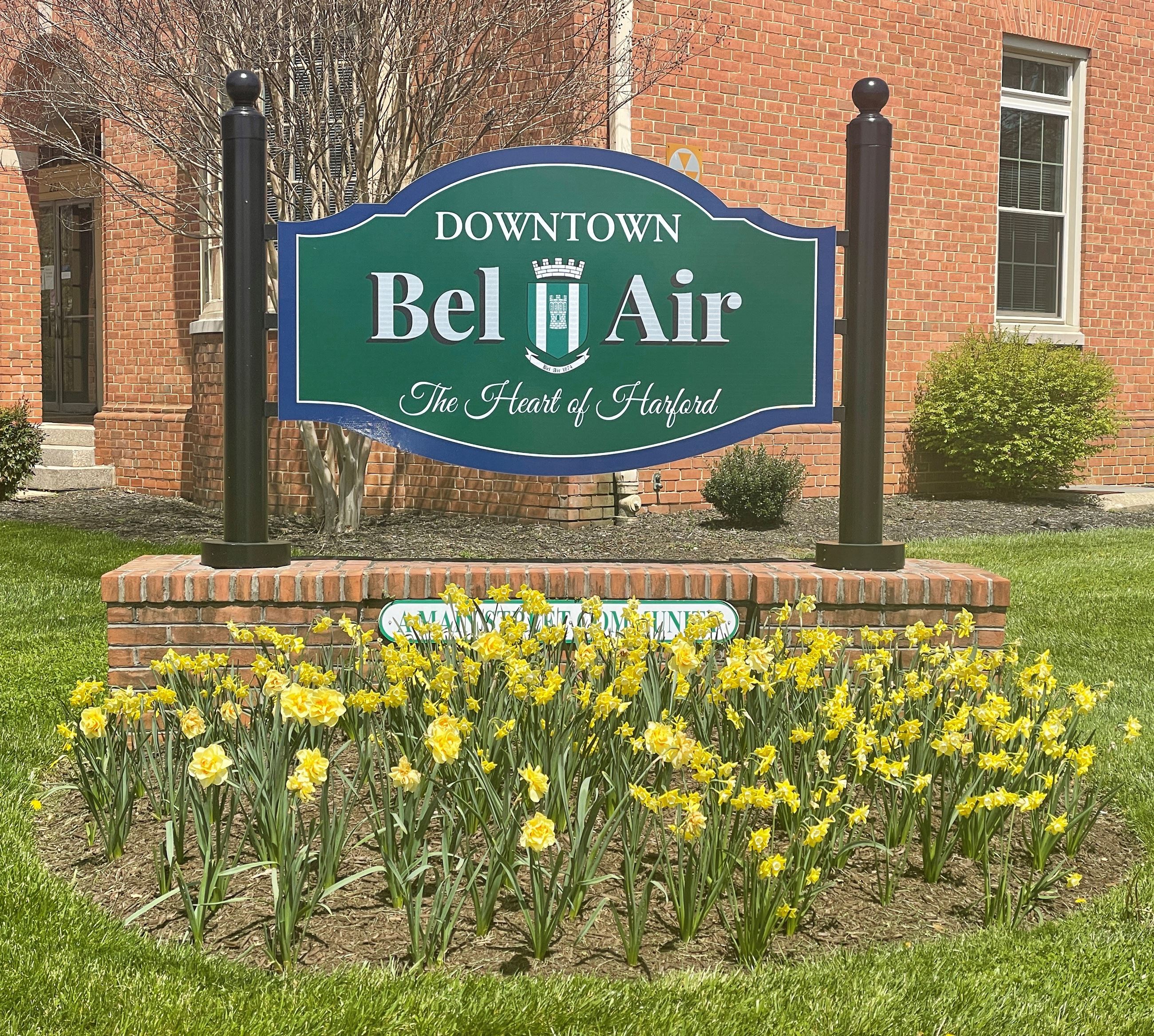 Welcome to Bel Air sign surrounded by flowers