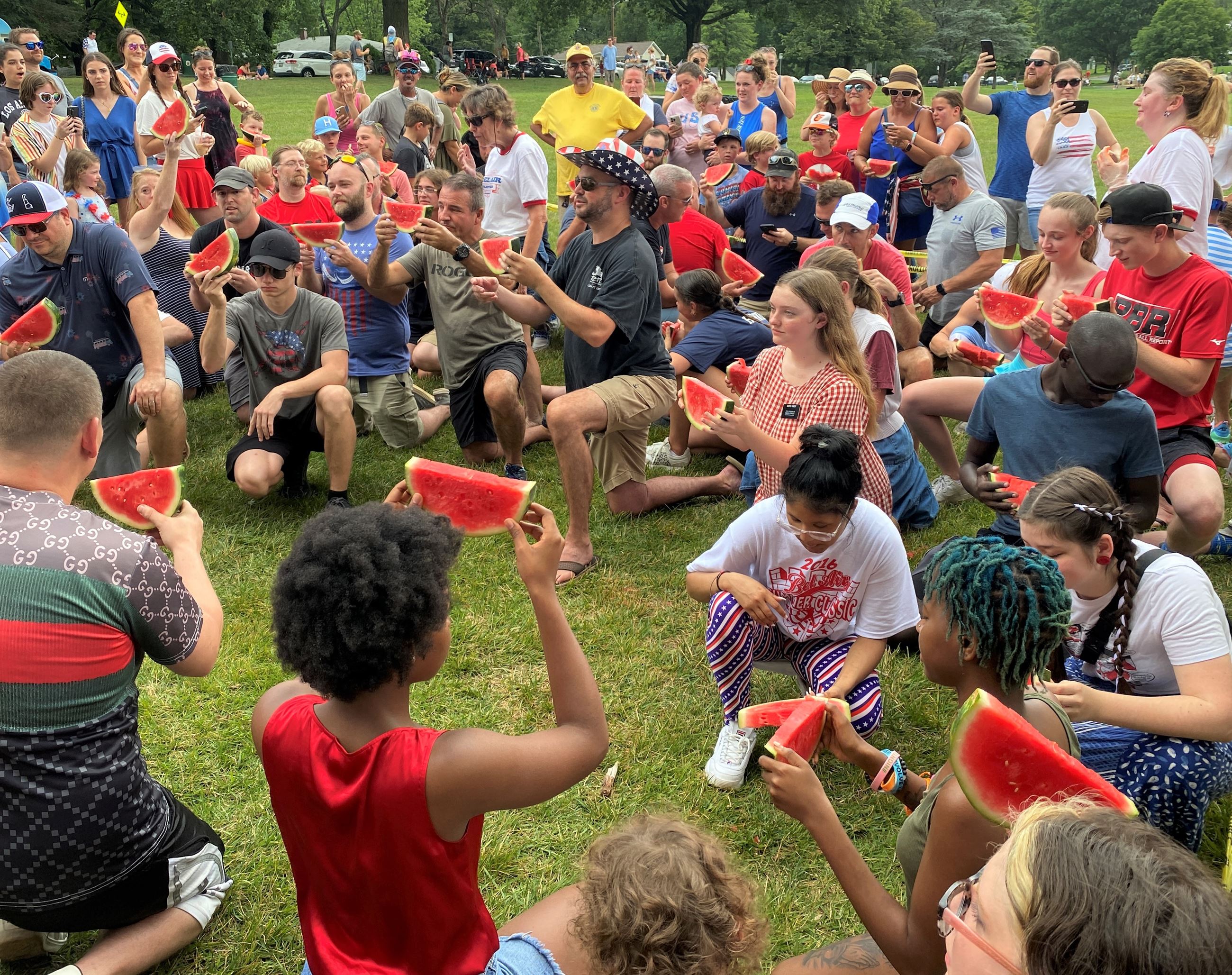 Photo of watermelon eating contest on July 4, 2023